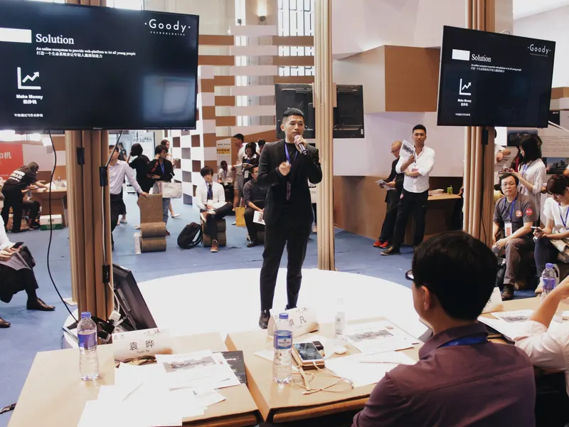 Aaron Lim pitching Goody Technologies to a judging panel in Xiamen, China, 2018