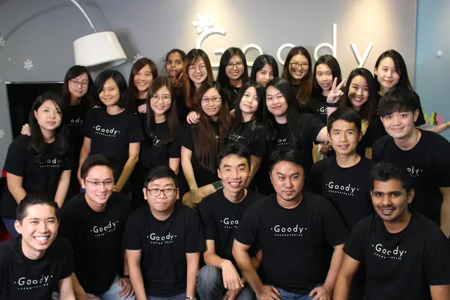 Aaron Lim with the Goody Technologies team in matching Goody shirts, 2018